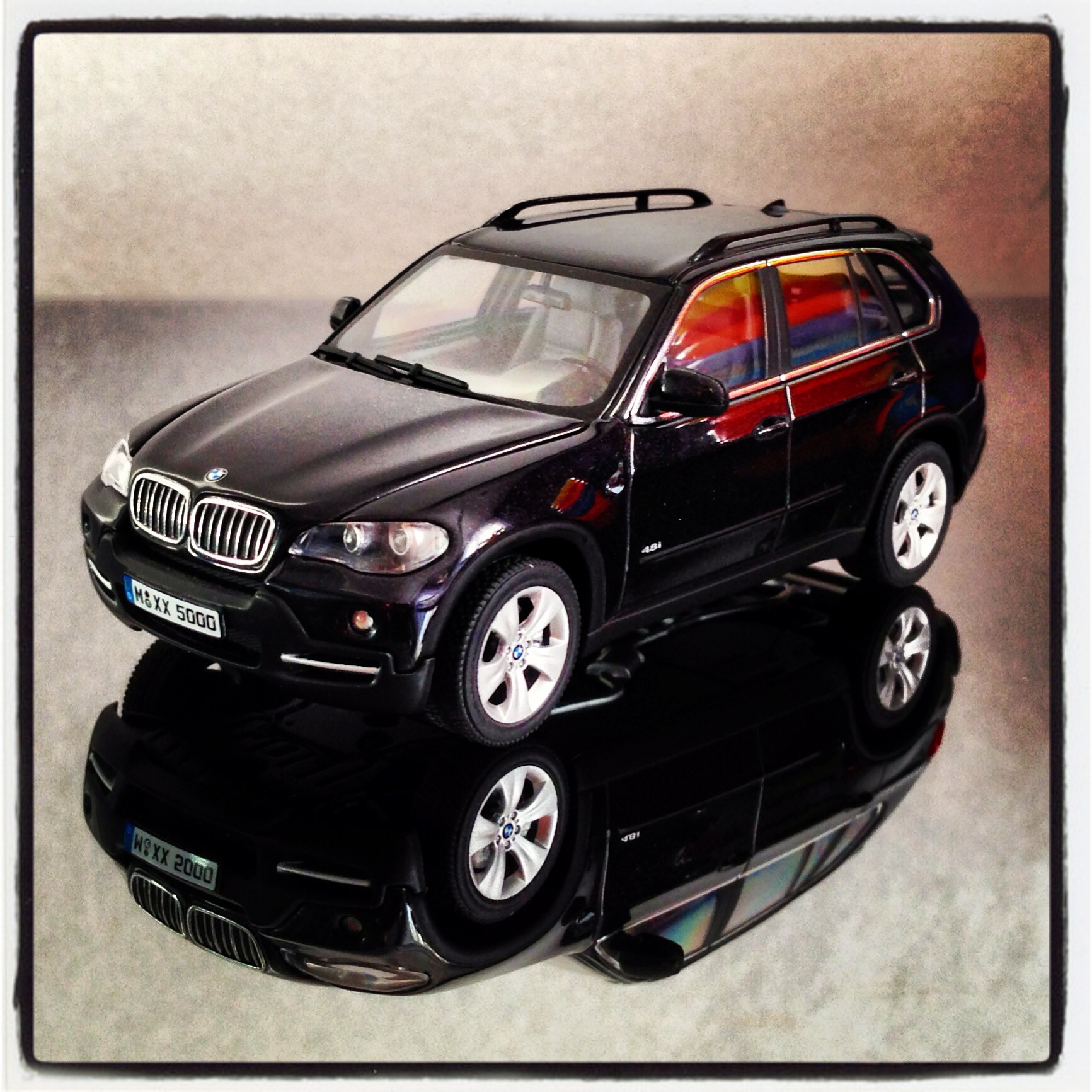 BMW X5 4.8i (E70) black saphire (autoart)